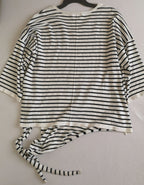 Palazzo y blusa con nudo