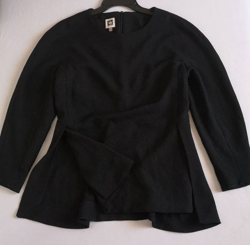 Blusa larga con pantalón corte recto