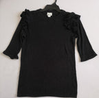 Vestido holgado y blusa con olanes