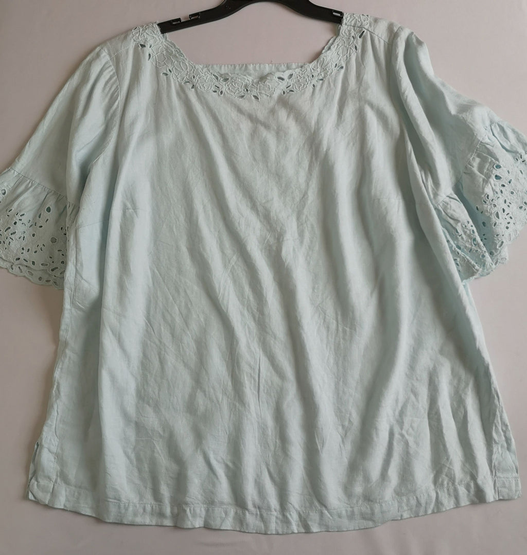 Blusa bordada de las mangas
