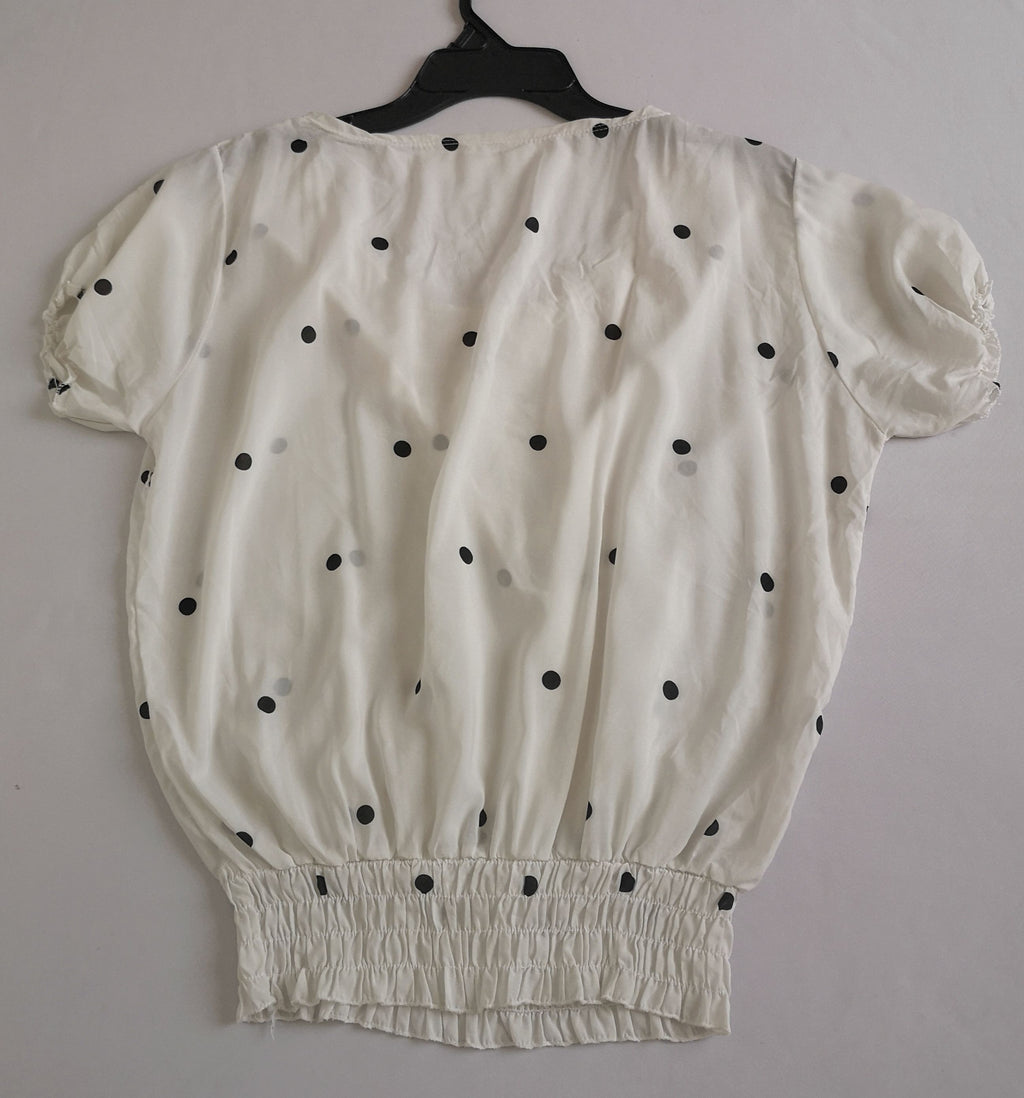Pantalón strech y blusa con elástico abajo
