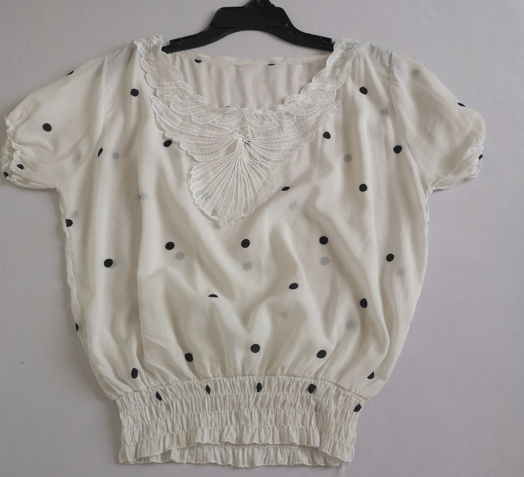 Pantalón strech y blusa con elástico abajo