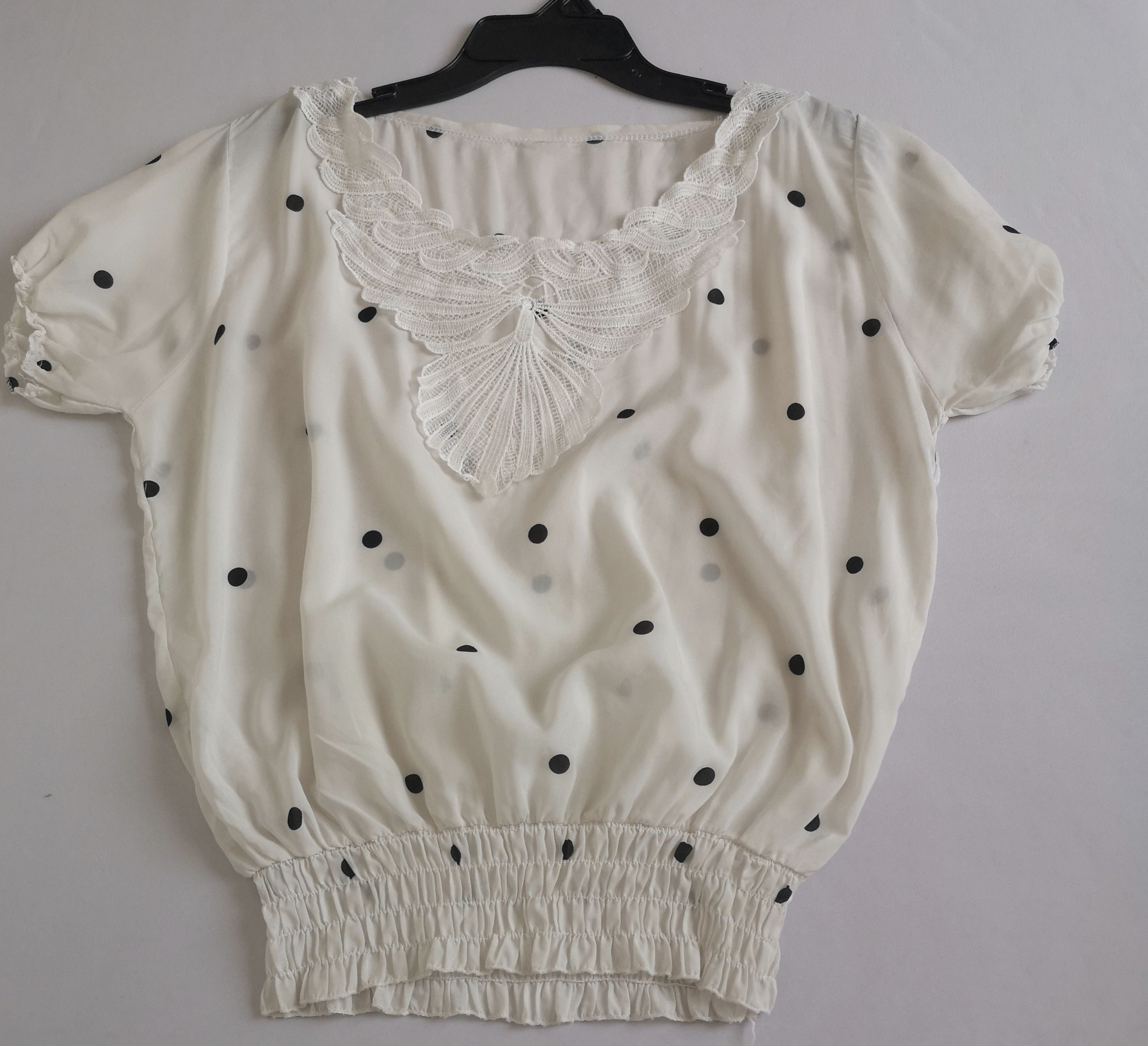 Pantalón strech y blusa con elástico abajo
