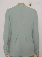 Blusa manga larga