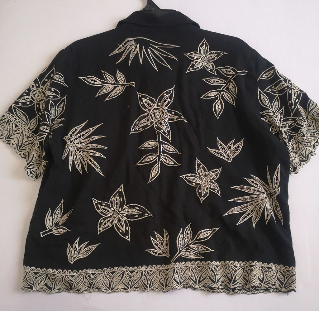 Blusa de lino bordada