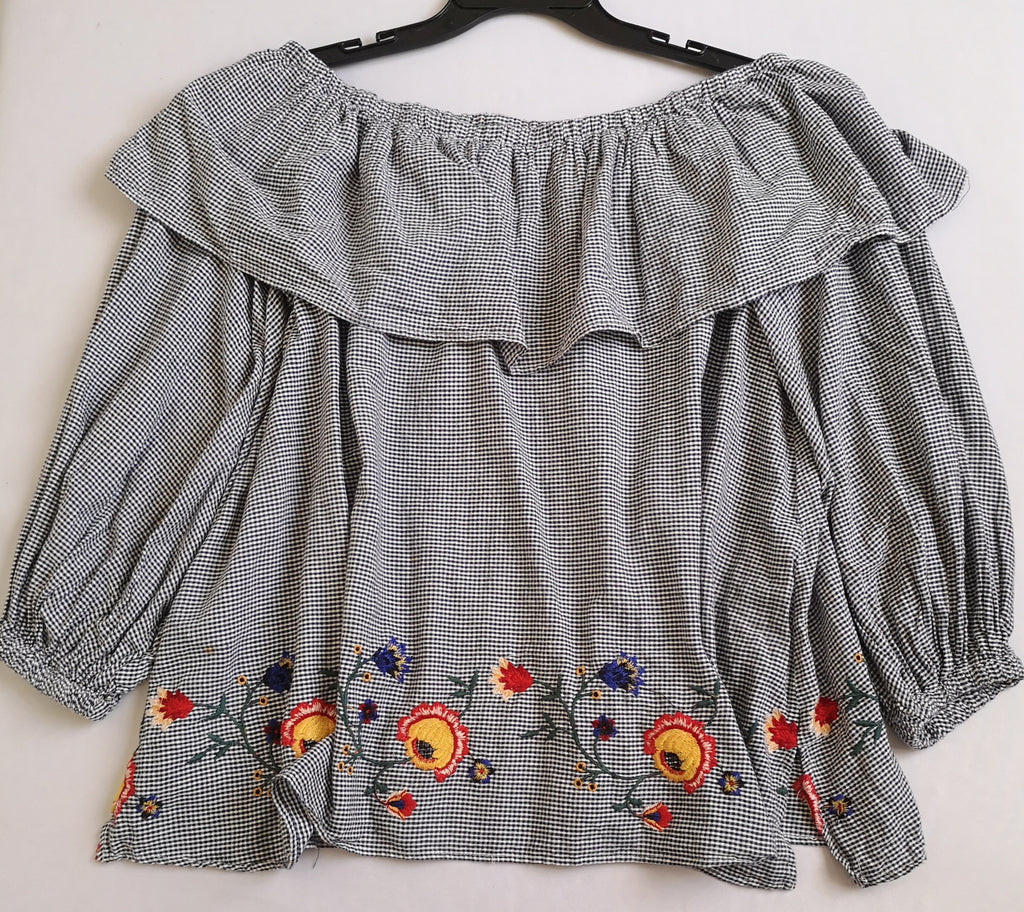 Blusa hombros descubiertos estilo holgado