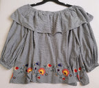 Blusa hombros descubiertos estilo holgado
