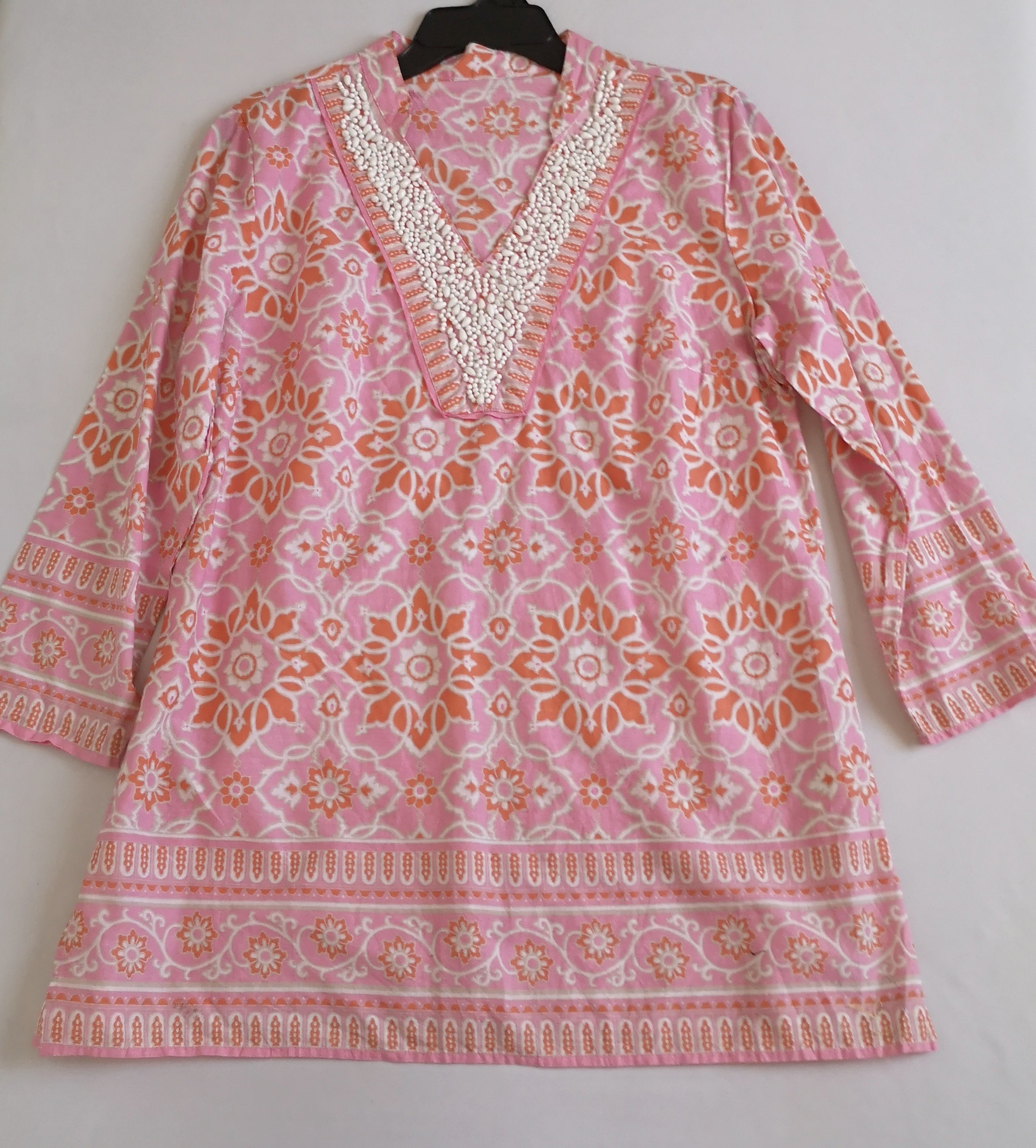 Blusa tipo túnica