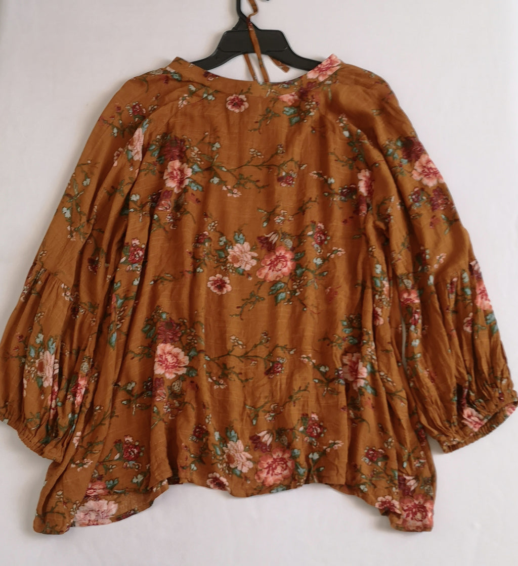 Pantalón tipo seda y blusa boho
