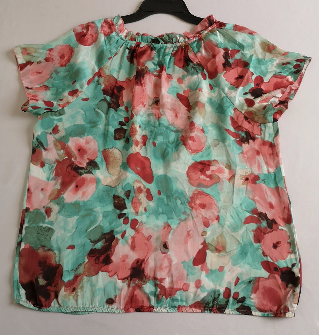Blusa tipo seda y pantalón de terciopelo