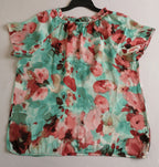 Blusa tipo seda y pantalón de terciopelo