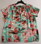 Blusa tipo seda y pantalón de terciopelo