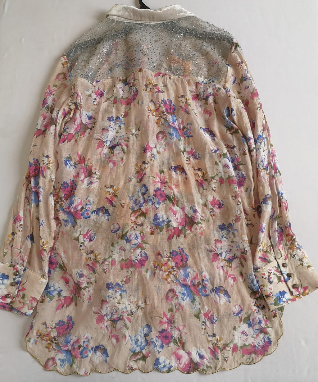 Blusa larga bordada