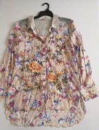 Blusa larga bordada