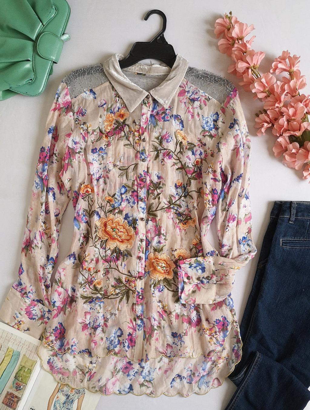 Blusa larga bordada
