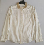 Blusa con lentejuelas en el cuello