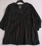 Blusa nueva bordada y falda con short adentro