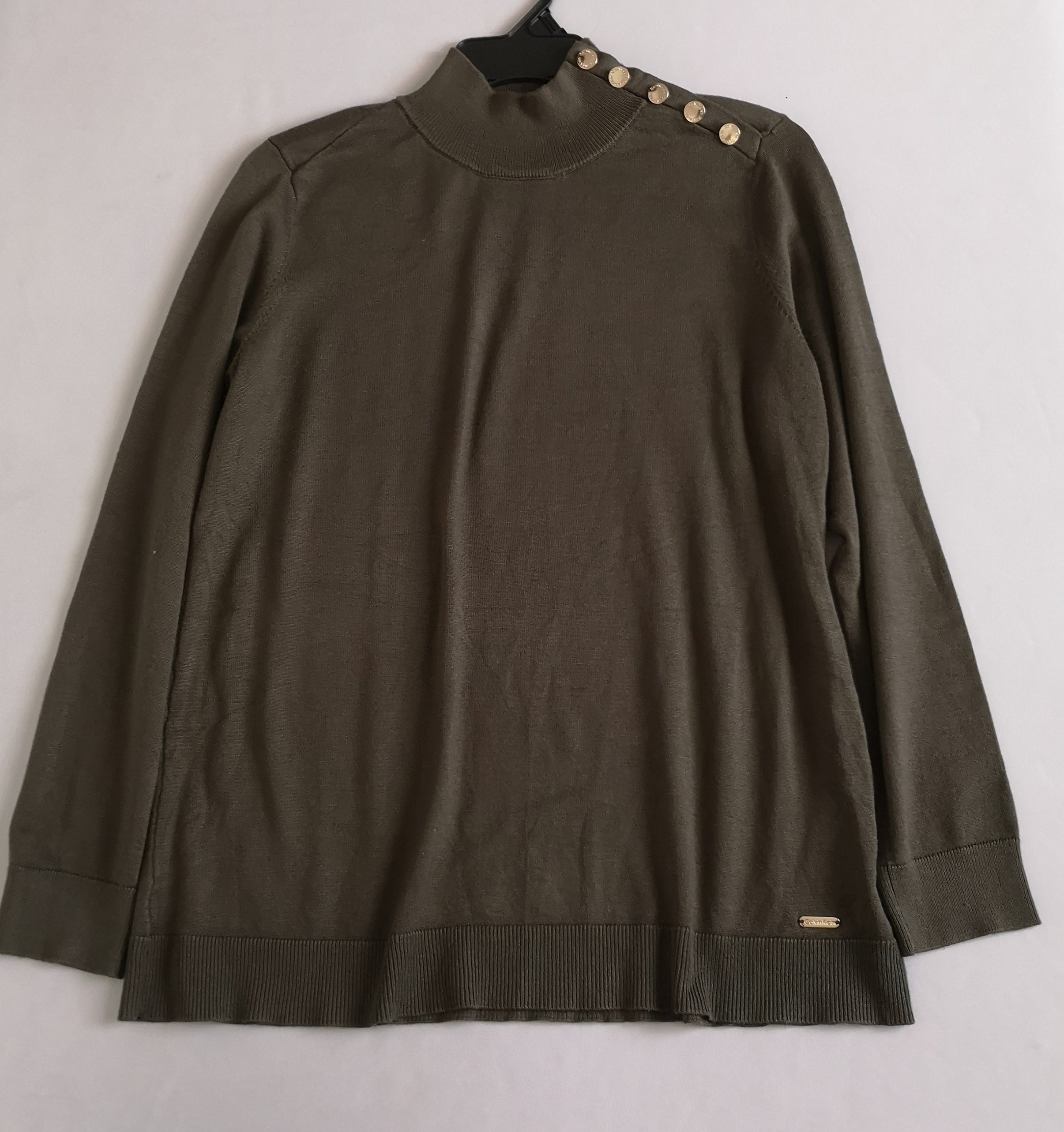 Blusa Calvin Klein con botones en el cuello