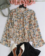 Blusa de chifon con cinto