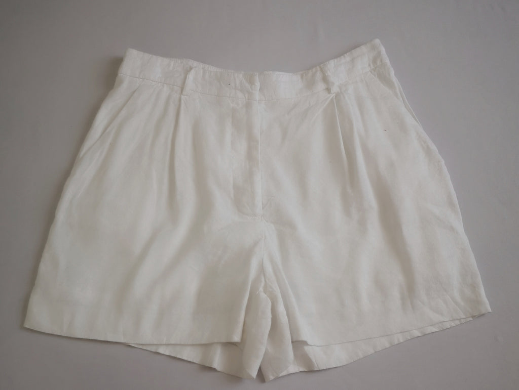 Blusa manga larga y short con bolsas a los lados