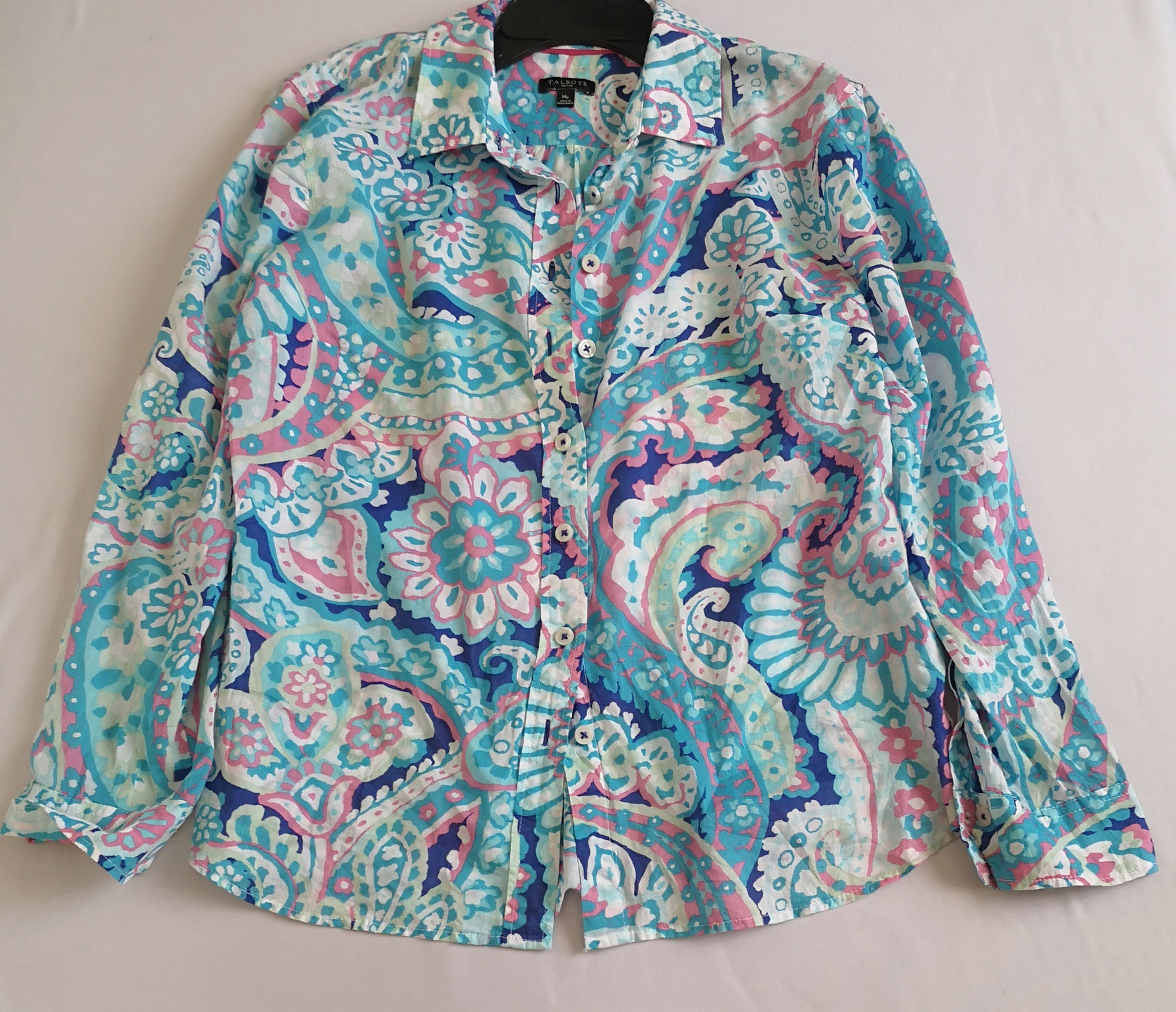 Blusa manga larga y short con bolsas a los lados