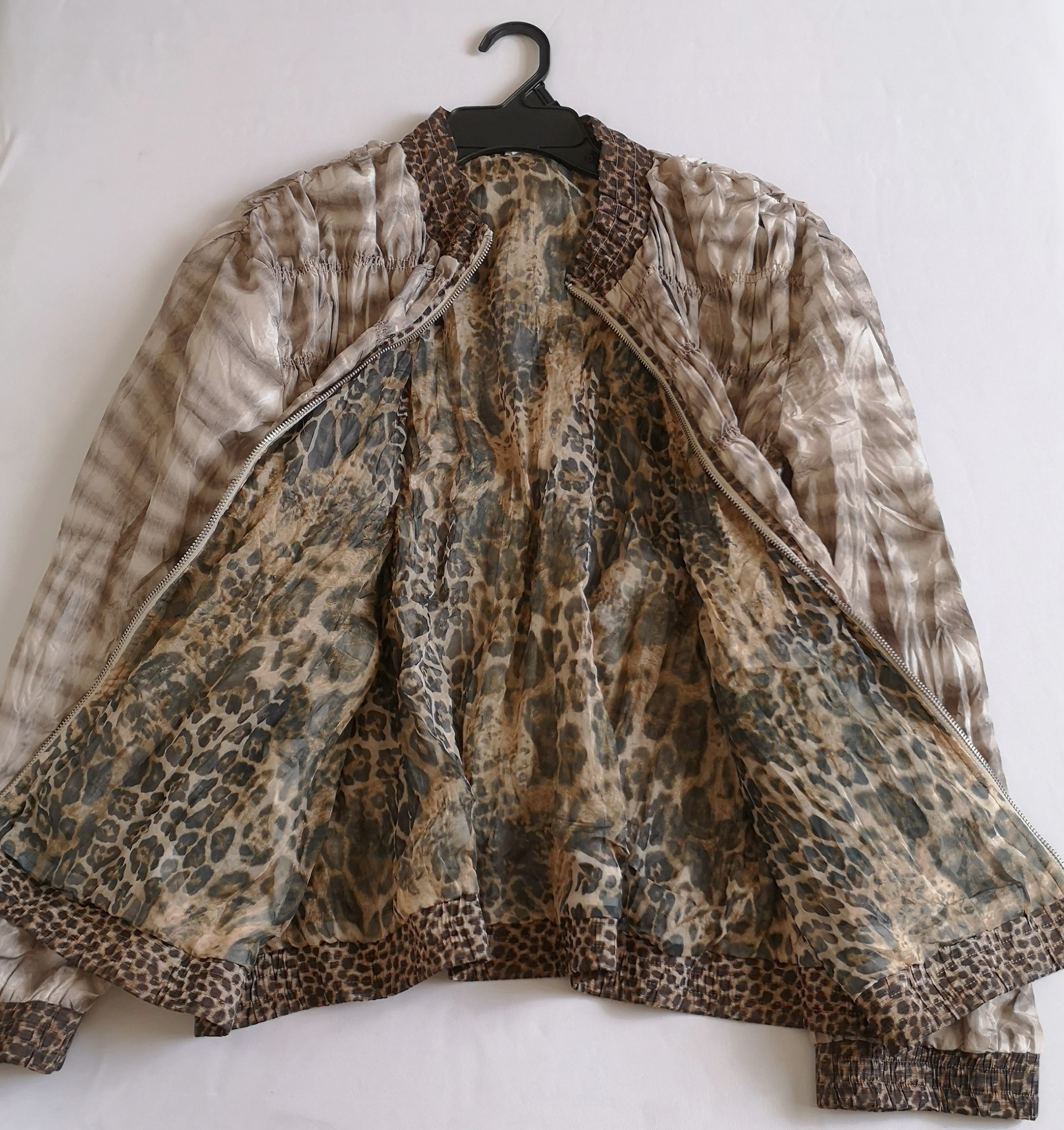 Chaqueta corrugada con blusa sin mangas