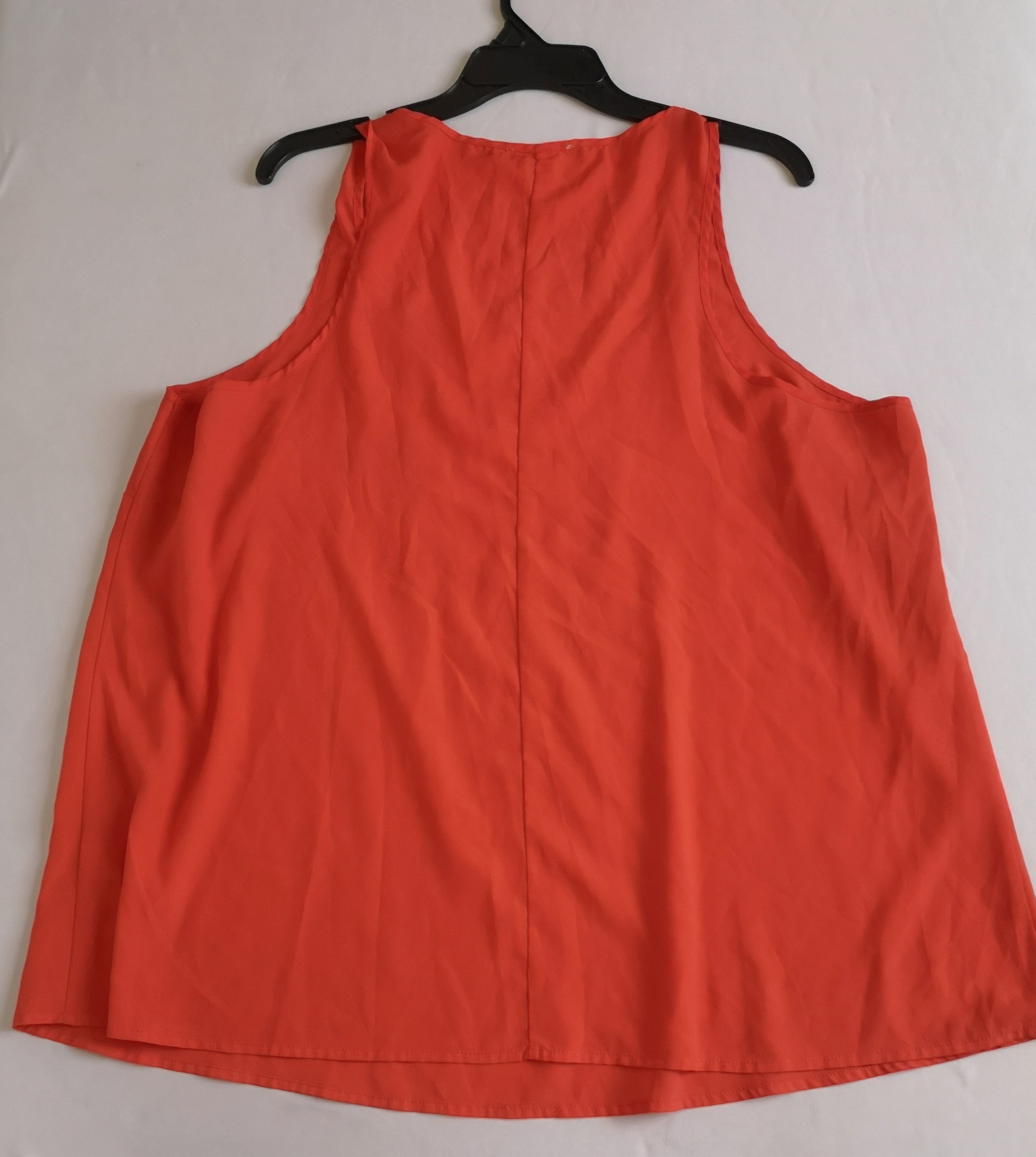 Chaqueta corrugada con blusa sin mangas
