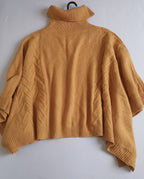 Poncho cuello alto