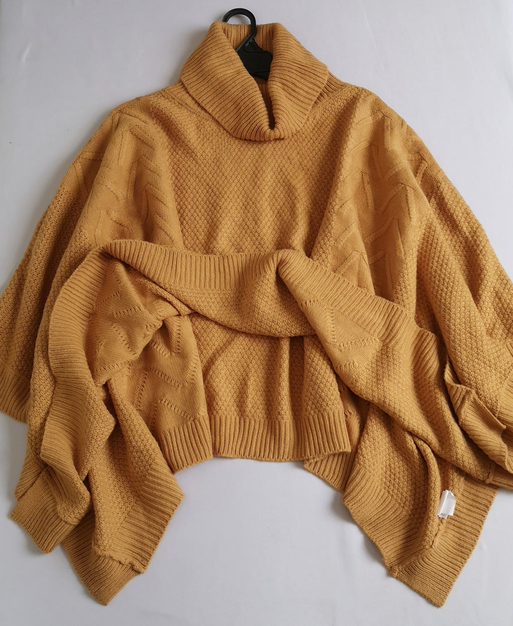Poncho cuello alto