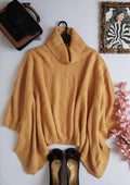 Poncho cuello alto