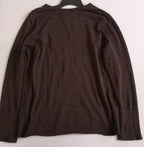 Blusa con botones en las mangas y pantalón stresh