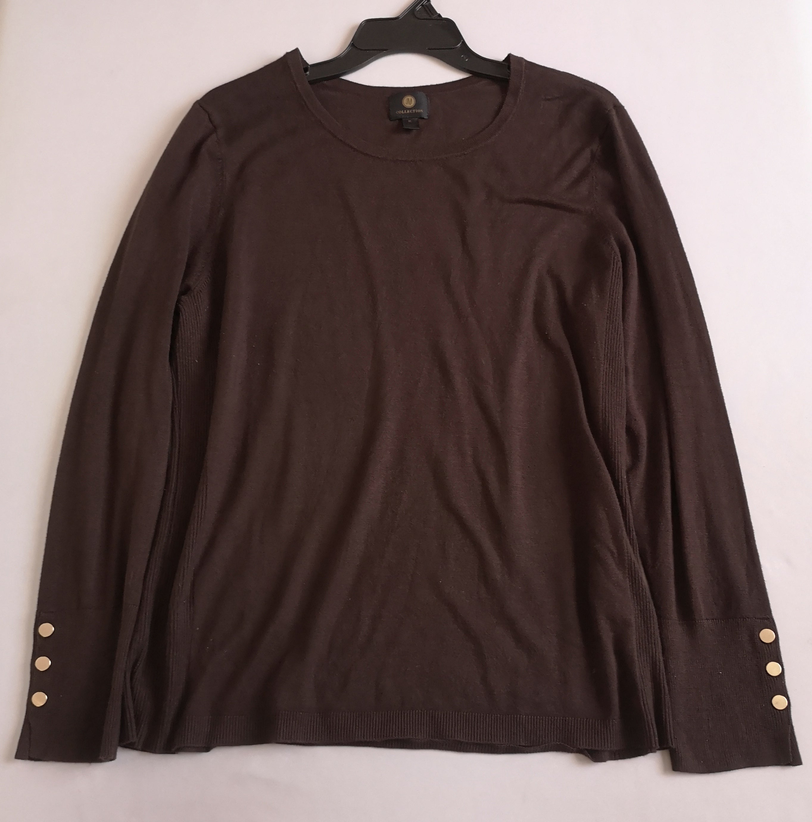 Blusa con botones en las mangas y pantalón stresh