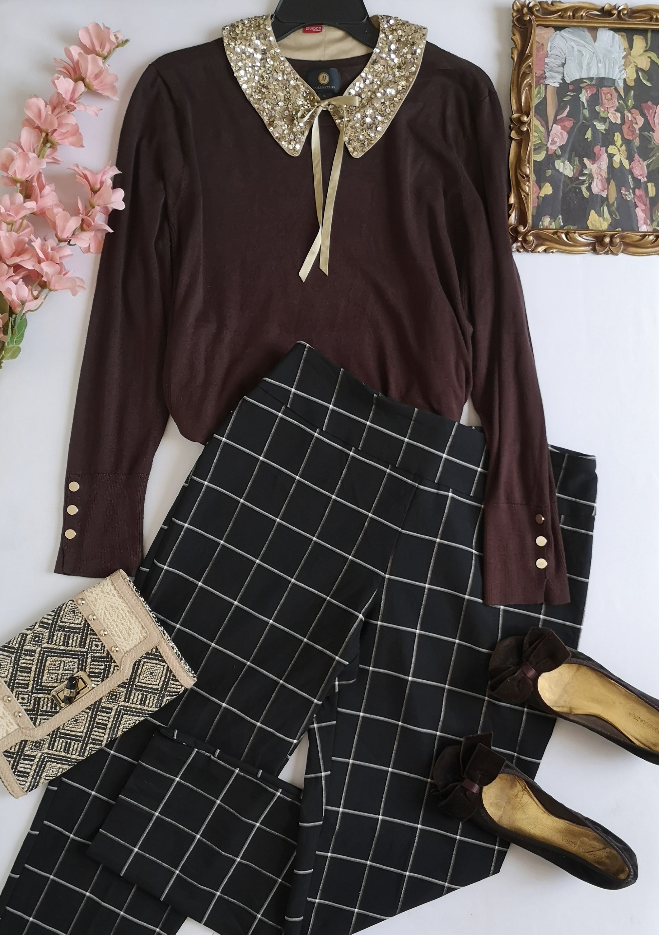 Blusa con botones en las mangas y pantalón stresh
