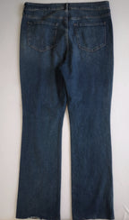 Jeans bootcut con blusa manga larga