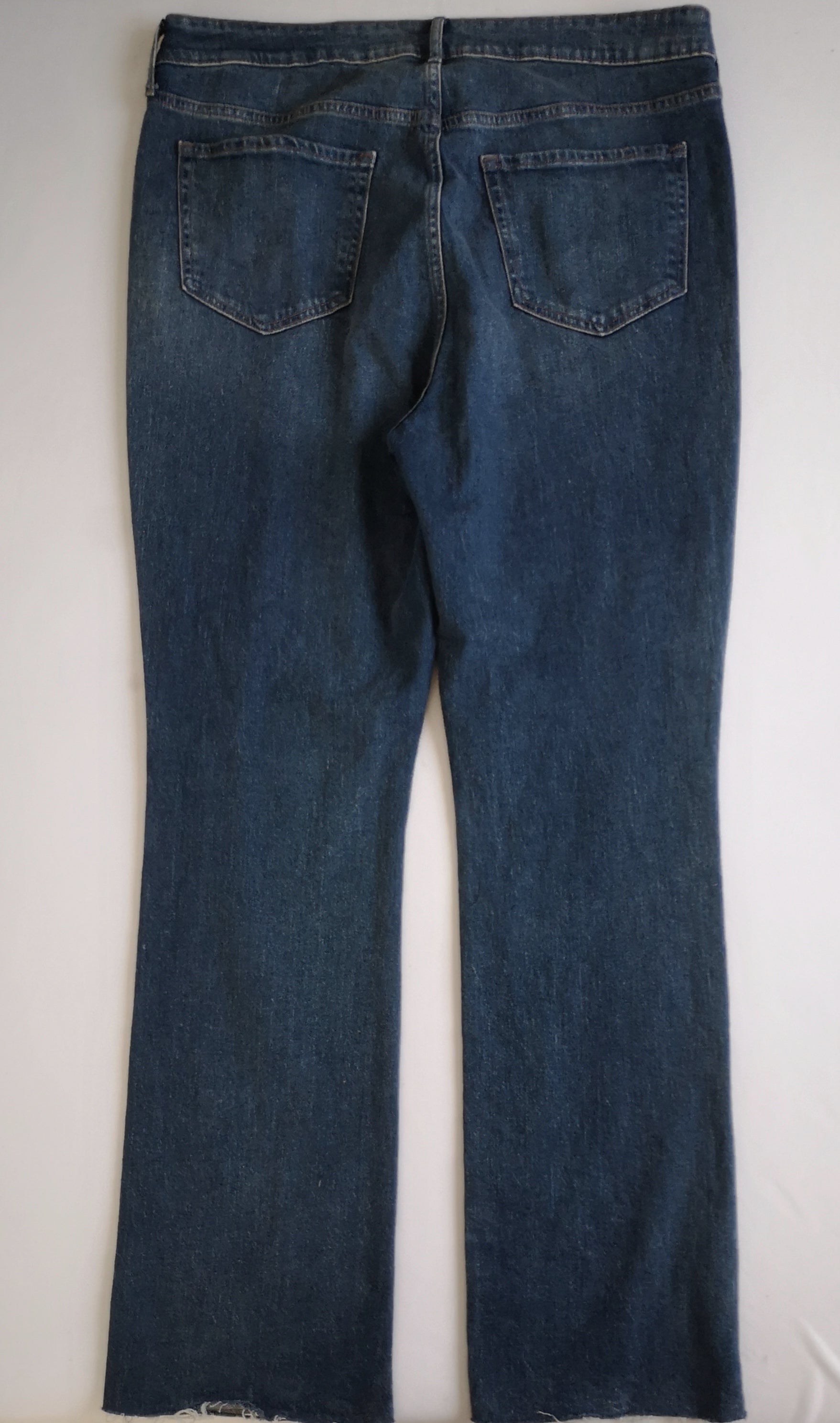 Jeans bootcut con blusa manga larga