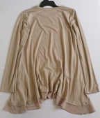 Blusa larga con bolsas a los lados