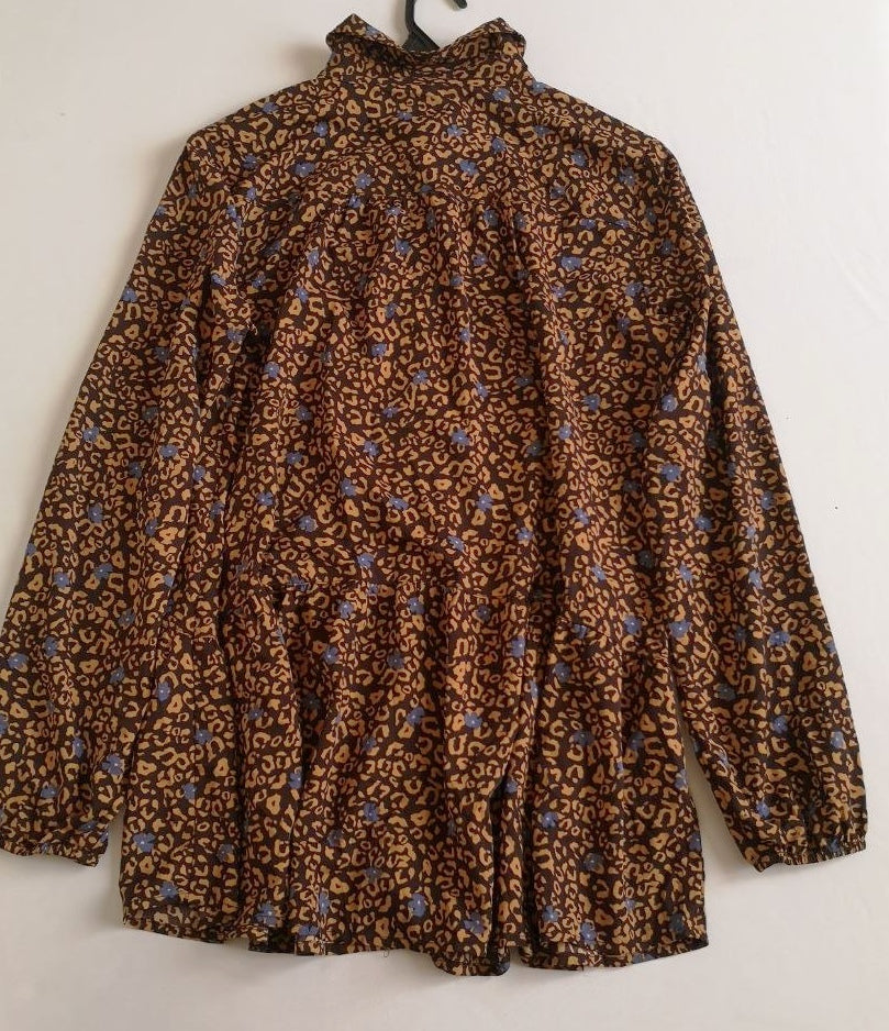 Blusa larga incluye cincho