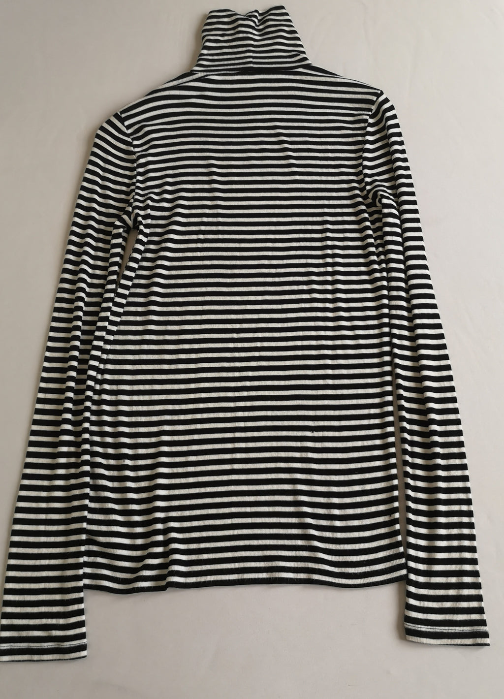 Blusa larga cuello alto