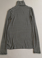Blusa larga cuello alto