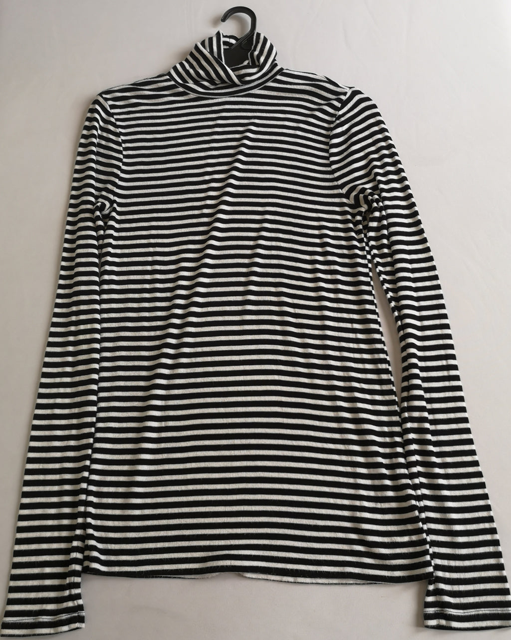 Blusa larga cuello alto