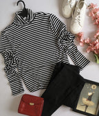 Blusa larga cuello alto