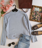 Blusa cuello alto