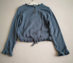 Jeans con blusa bordada