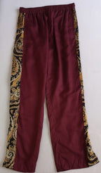 Pantalón con broches a los lados y blusa corta ⚓