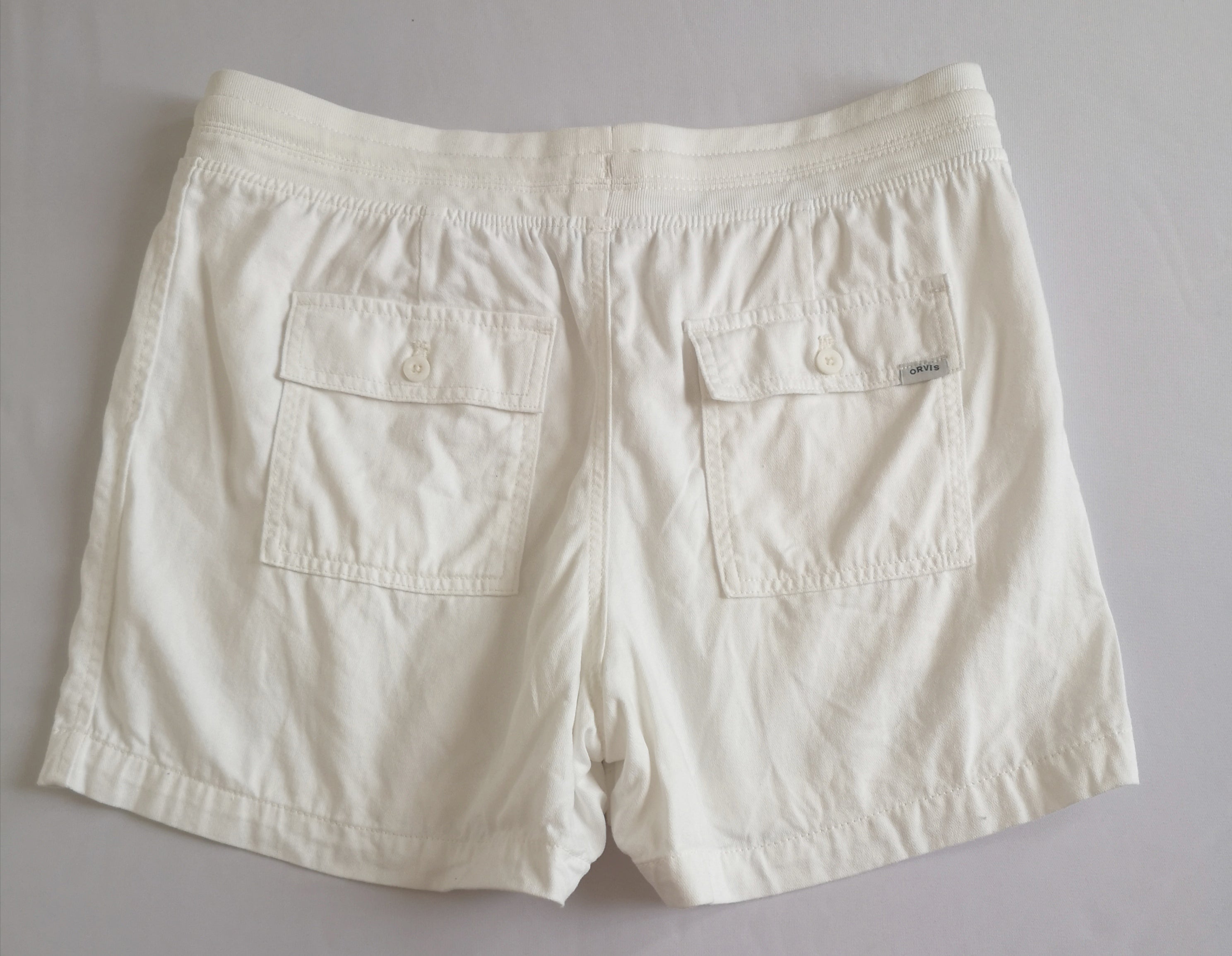 Short con bolsas y blusa tipo seda