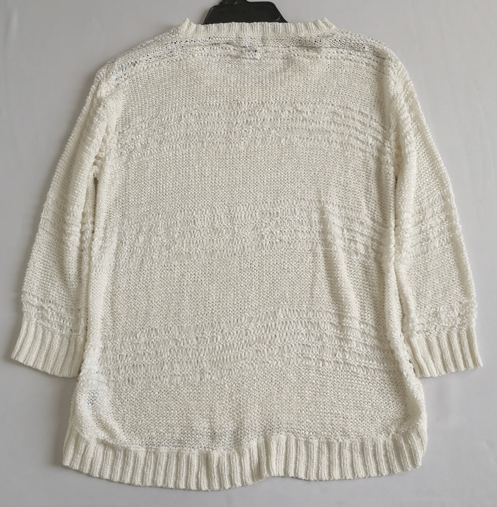 Blusa tejida con falda corta bordada