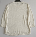 Blusa tejida con falda corta bordada