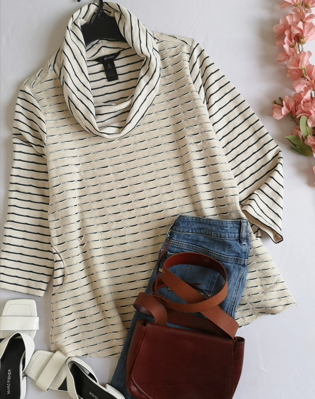 Blusa larga con bolsa a los lados