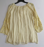 Blusa bordada de abajo