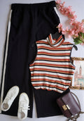 Palazzo con bolsas a los lados y blusa cuello alto